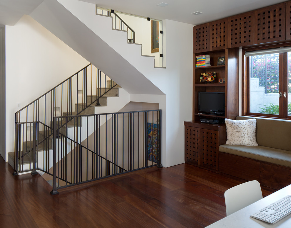 Mid-sized transitional u-shaped staircase photo in San Diego with concrete risers
