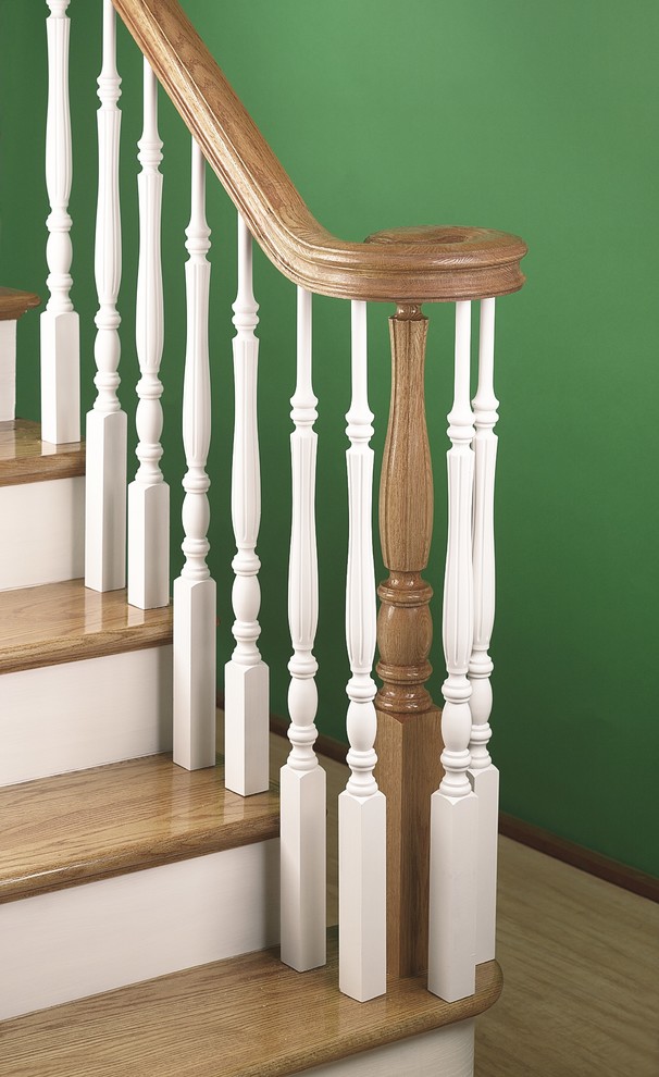 Idées déco pour un escalier peint classique en L avec des marches en bois.