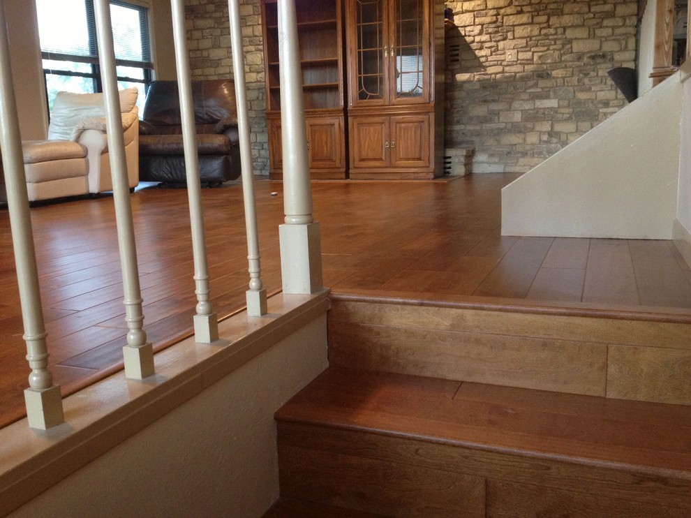 Inspiration for a contemporary wooden straight staircase remodel in Austin with wooden risers