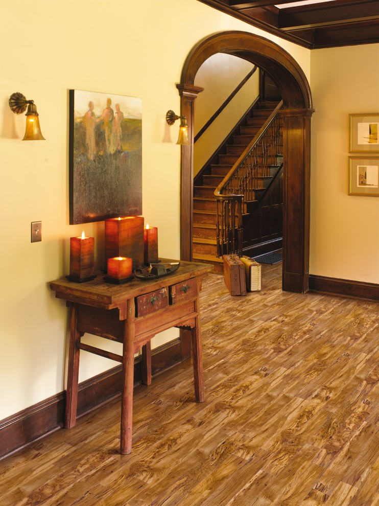 Inspiration for a mid-sized rustic wooden straight staircase remodel in Salt Lake City with wooden risers