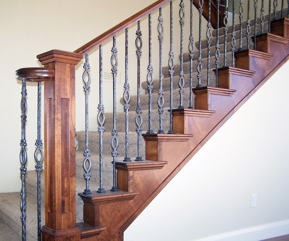 Staircase - mid-sized traditional carpeted straight staircase idea in Salt Lake City with carpeted risers