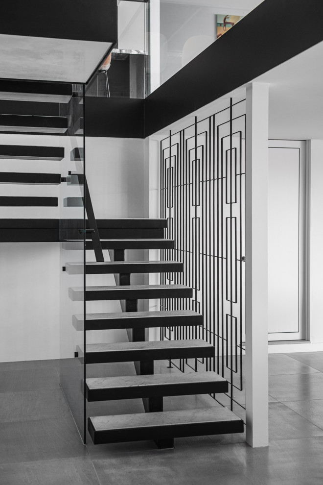 Design ideas for an u-shaped staircase in Sydney with open risers.