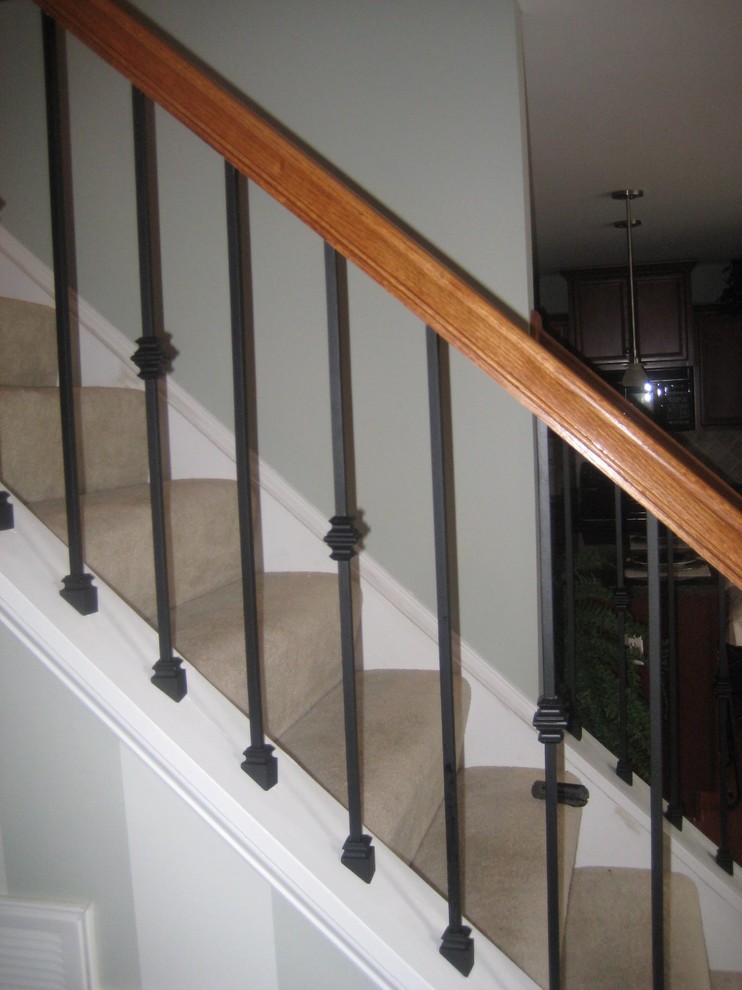 Wrought iron baluster installation Traditional Staircase Richmond