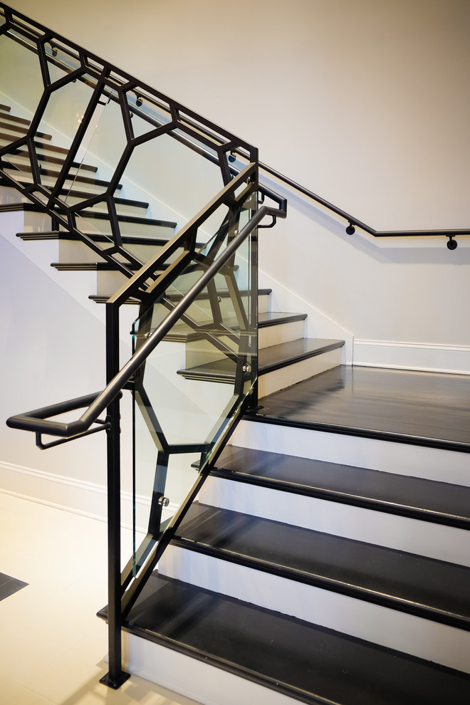 Minimalist wooden staircase photo in Atlanta with painted risers