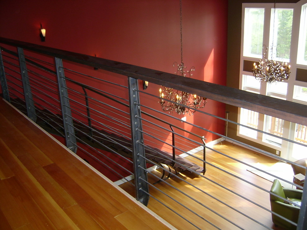 Inspiration for a contemporary wood straight staircase in Philadelphia with open risers.