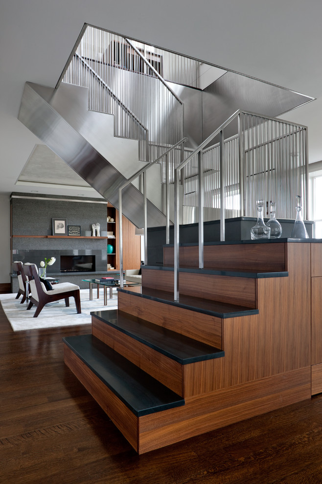 Design ideas for a medium sized contemporary u-shaped staircase in Boston.