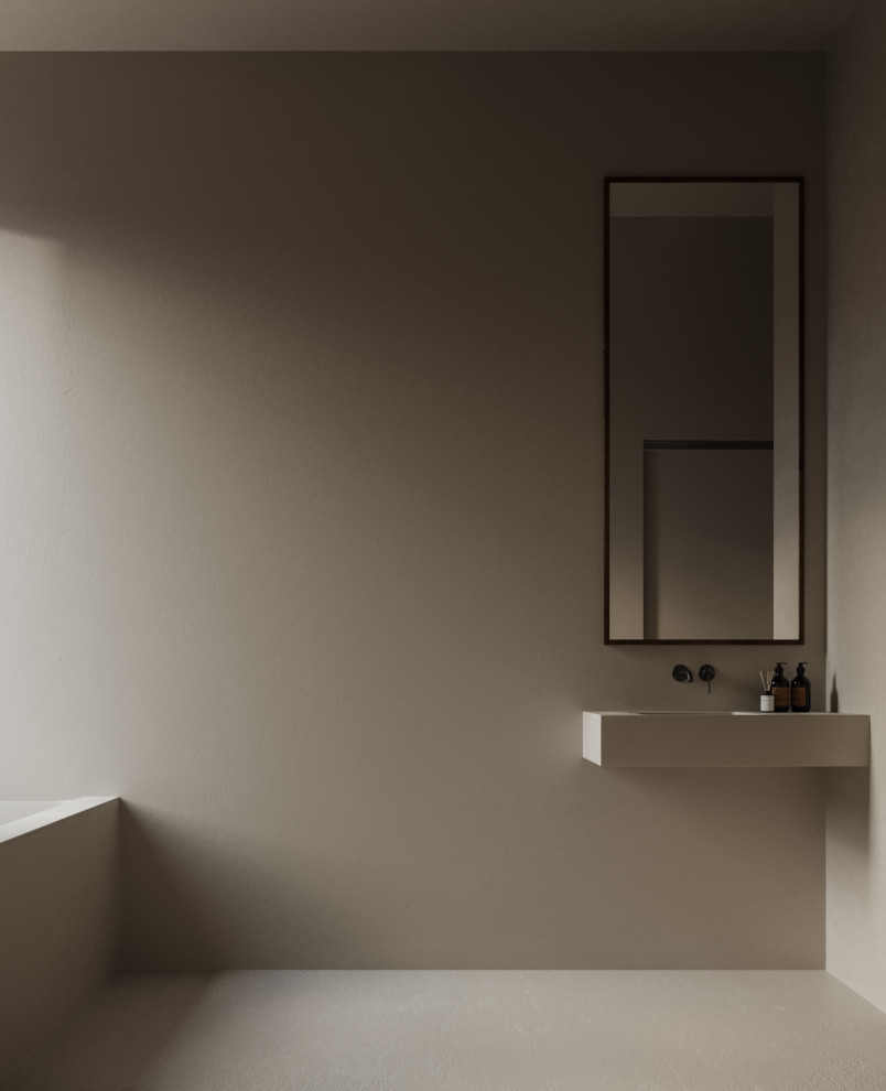 Foto på ett litet funkis beige en-suite badrum, med ett badkar i en alkov, en dusch i en alkov, en vägghängd toalettstol, spegel istället för kakel, beige väggar, betonggolv, ett väggmonterat handfat, bänkskiva i betong, beiget golv och med dusch som är öppen