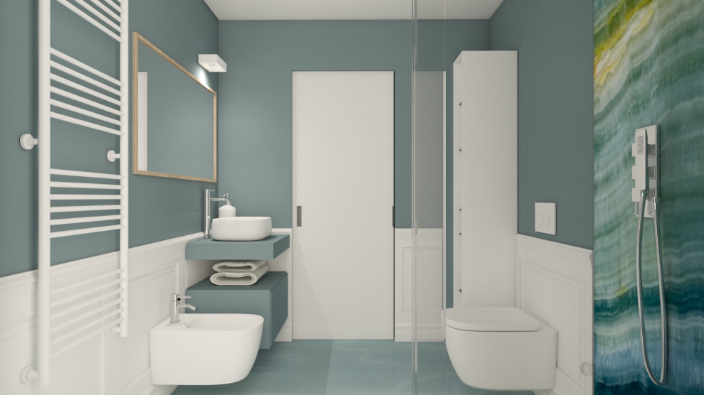 Réalisation d'une petite salle d'eau tradition avec un placard à porte affleurante, des portes de placard bleues, une douche d'angle, WC suspendus, un carrelage bleu, un mur bleu, un sol en marbre, une vasque, un plan de toilette en carrelage, un sol turquoise, une cabine de douche à porte battante, un plan de toilette bleu, meuble simple vasque, meuble-lavabo suspendu et boiseries.