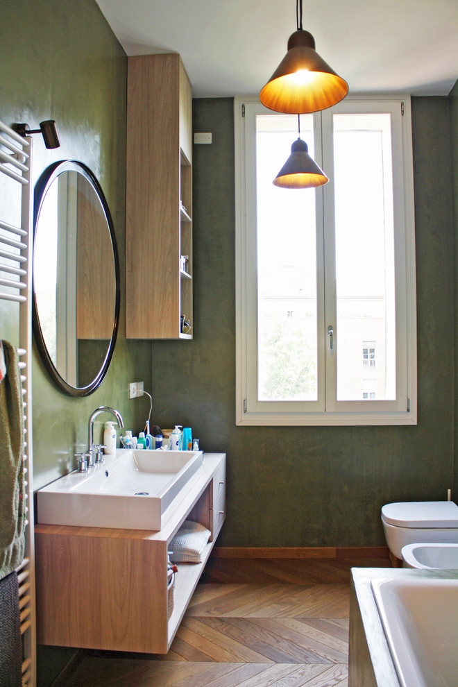 Ispirazione per una stanza da bagno contemporanea con pareti verdi
