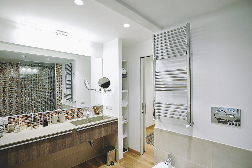 Large trendy beige tile, white tile, brown tile and mosaic tile light wood floor bathroom photo in Rome with flat-panel cabinets, medium tone wood cabinets, white walls and an integrated sink