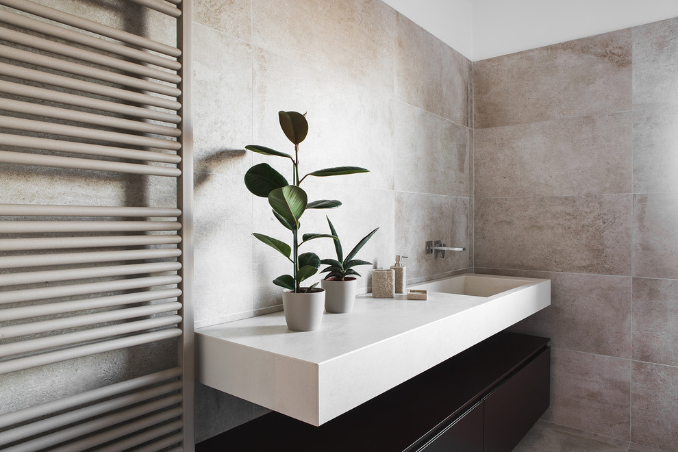 Medium sized traditional shower room bathroom in Bologna with flat-panel cabinets, brown cabinets, beige tiles, porcelain tiles, white walls, porcelain flooring, an integrated sink, solid surface worktops and beige floors.