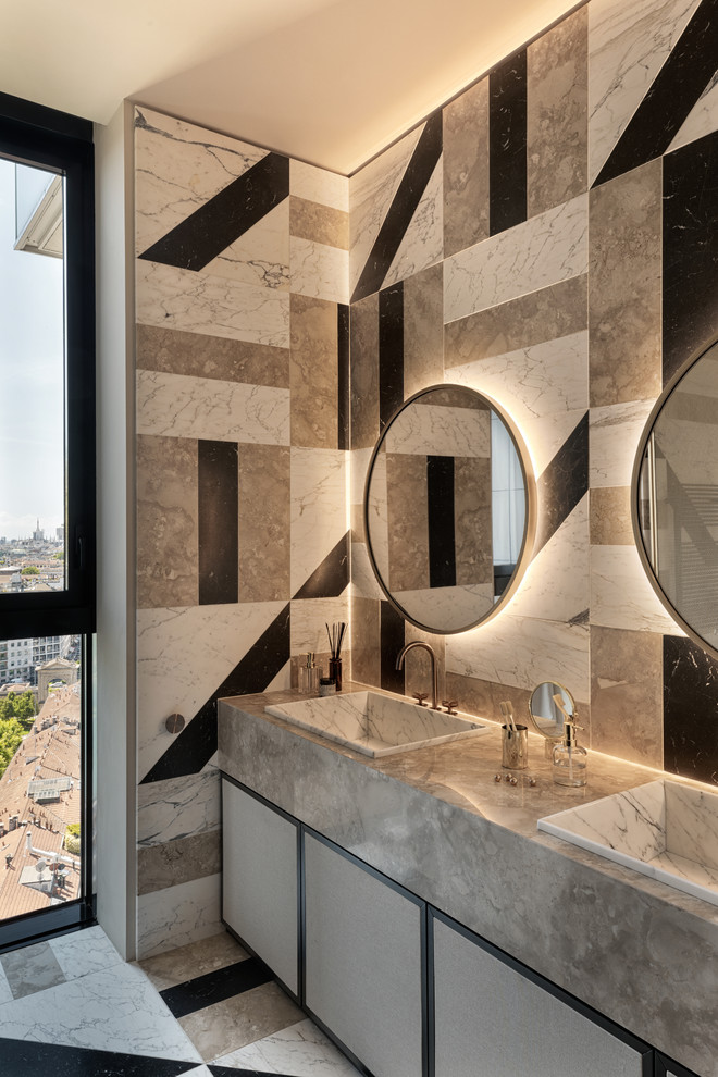 Modernes Badezimmer En Suite mit flächenbündigen Schrankfronten, beigen Schränken, farbigen Fliesen, Einbauwaschbecken, buntem Boden und grauer Waschtischplatte in Sonstige