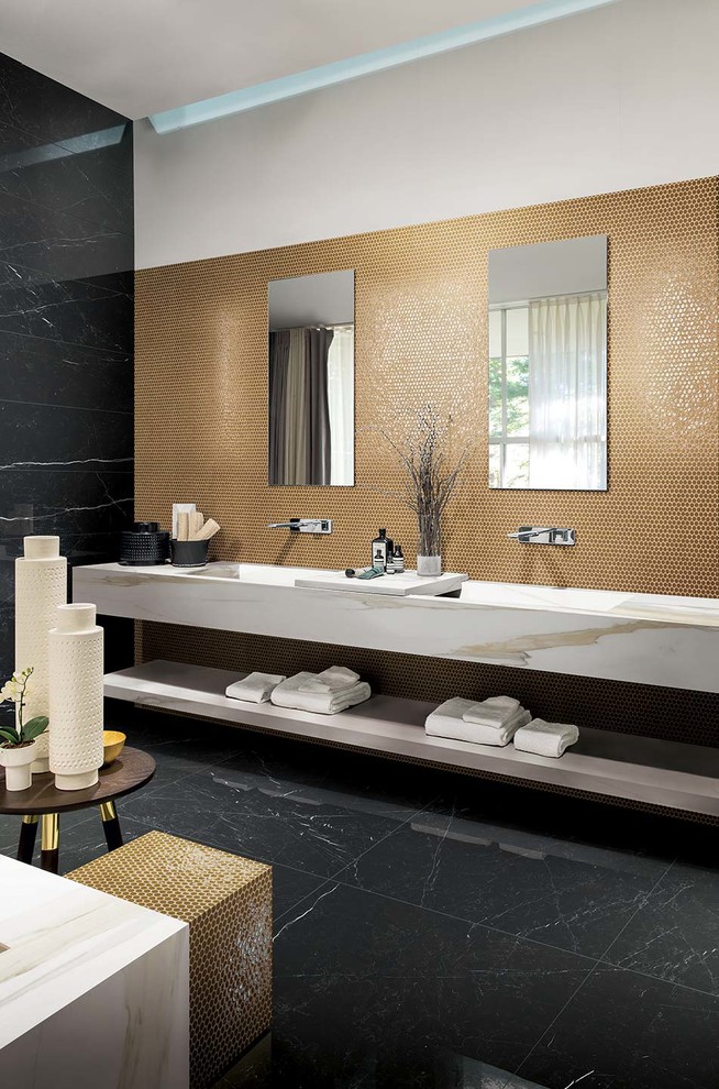 Inspiration for a medium sized modern ensuite bathroom in Bologna with white cabinets, yellow tiles, porcelain tiles, white walls, porcelain flooring, an integrated sink, tiled worktops, black floors and white worktops.