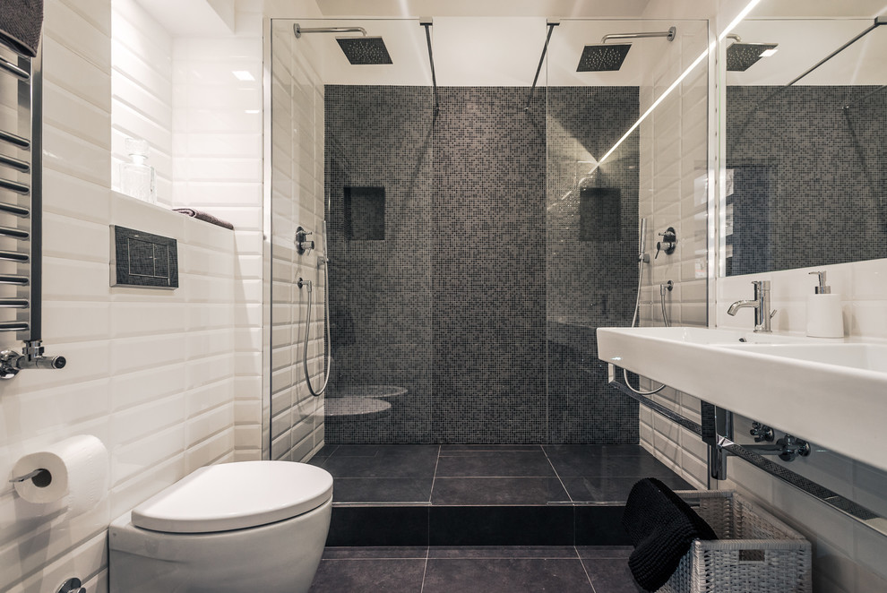 Esempio di una stanza da bagno con doccia minimal con lavabo rettangolare, doccia doppia, WC monopezzo, piastrelle bianche e piastrelle diamantate