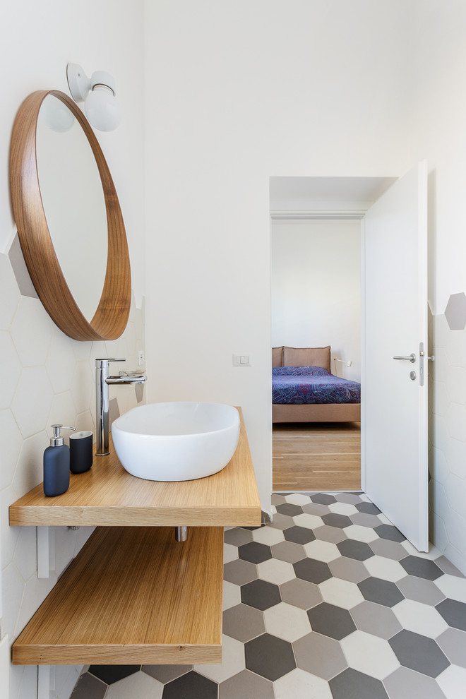 Esempio di una stanza da bagno minimal con pavimento con piastrelle in ceramica e pavimento multicolore