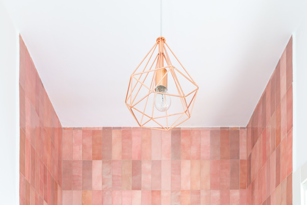 Small danish 3/4 pink tile and ceramic tile porcelain tile, beige floor and single-sink bathroom photo in Milan with flat-panel cabinets, white cabinets, white walls, a vessel sink, white countertops, a wall-mount toilet and a floating vanity