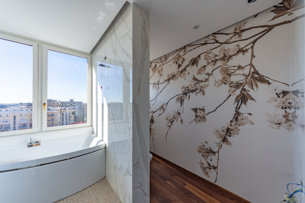 Large contemporary shower room bathroom in Milan with flat-panel cabinets, white cabinets, a hot tub, an alcove shower, a wall mounted toilet, white tiles, porcelain tiles, white walls, medium hardwood flooring, a vessel sink, wooden worktops, brown floors, a sliding door and brown worktops.