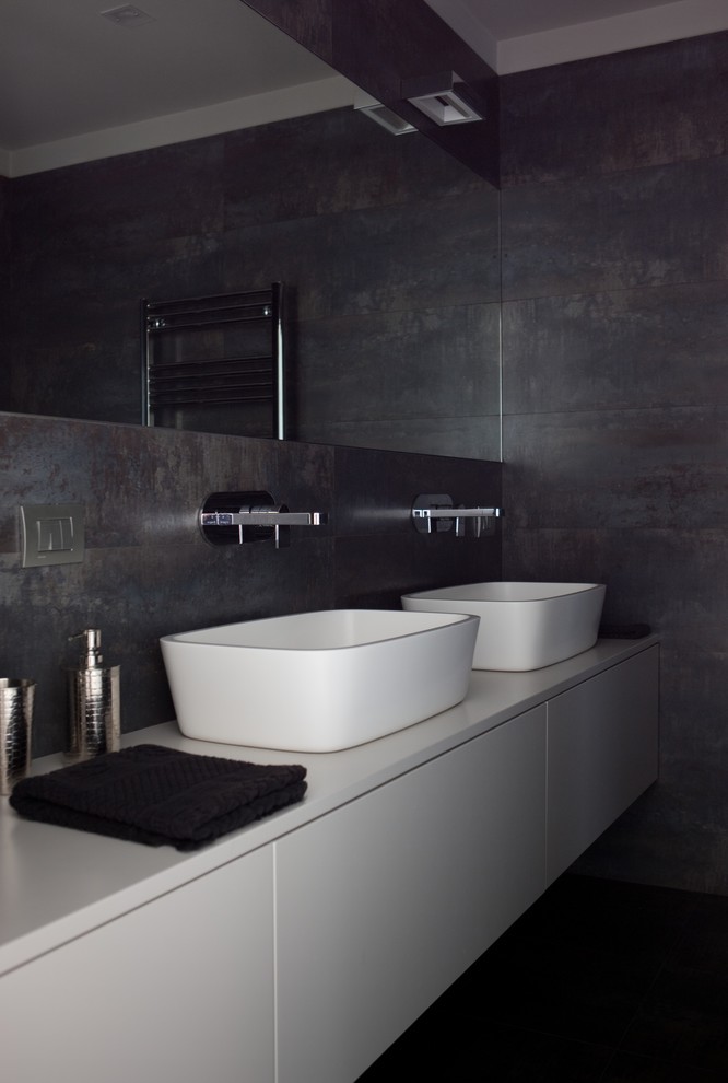 Immagine di una stanza da bagno moderna con nessun'anta, ante bianche, lavabo rettangolare e top bianco