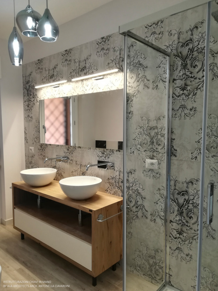 Inspiration for a large modern ensuite bathroom in Other with open cabinets, light wood cabinets, a corner shower, a two-piece toilet, black and white tiles, slate tiles, white walls, porcelain flooring, a vessel sink, wooden worktops, brown floors, a hinged door and brown worktops.