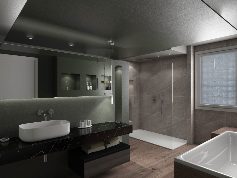 Inspiration pour une très grande salle de bain principale design en bois brun avec un placard à porte plane, une baignoire indépendante, une douche ouverte, WC séparés, un carrelage gris, des carreaux de porcelaine, un mur vert, un sol en carrelage imitation parquet, une vasque, un plan de toilette en marbre, un sol beige, aucune cabine, un plan de toilette noir, une niche, meuble simple vasque, meuble-lavabo suspendu, un plafond décaissé et du papier peint.