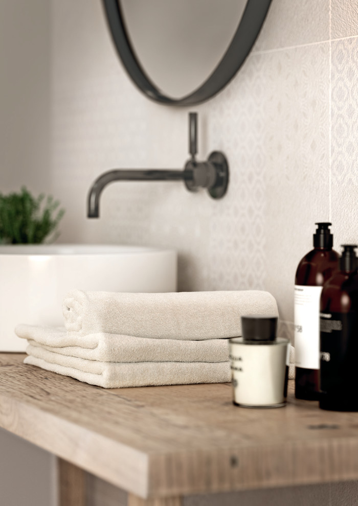 Inspiration for a contemporary beige tile and ceramic tile ceramic tile bathroom remodel in Bologna
