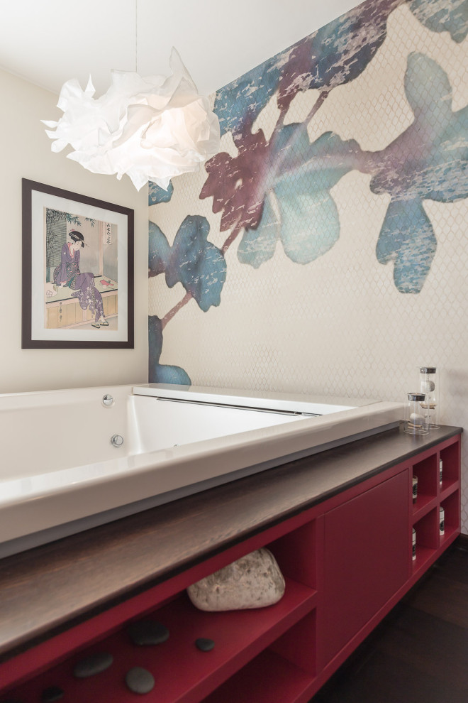 Example of a mid-sized eclectic master bathroom design in Rome with a hot tub