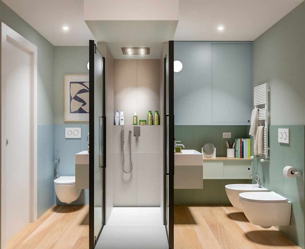 Идея дизайна: маленькая ванная комната в современном стиле с плоскими фасадами, зелеными фасадами, душем без бортиков, инсталляцией, разноцветной плиткой, керамогранитной плиткой, разноцветными стенами, светлым паркетным полом, душевой кабиной, настольной раковиной, душем с распашными дверями, тумбой под две раковины и подвесной тумбой для на участке и в саду
