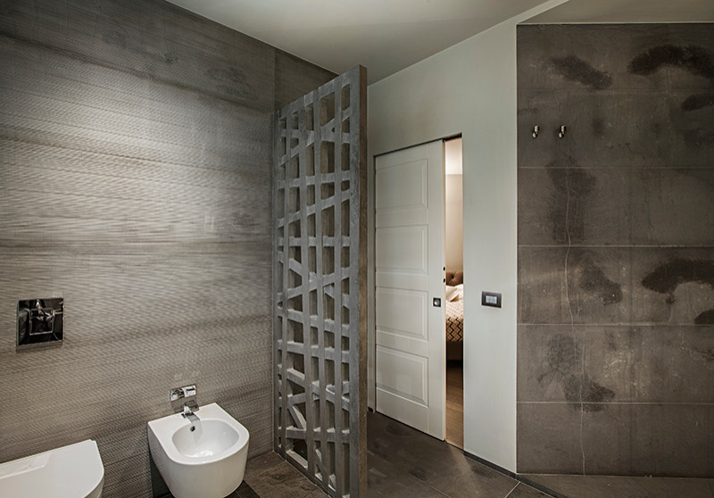 This is an example of a contemporary shower room bathroom in Other with brown cabinets, a built-in shower, brown tiles, marble tiles, brown walls, marble flooring, a vessel sink, marble worktops, brown worktops, double sinks and a floating vanity unit.