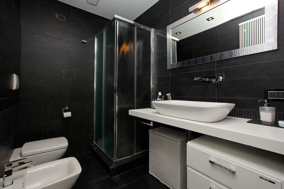 Inspiration for a medium sized contemporary shower room bathroom in Rome with light wood cabinets, a corner shower, a wall mounted toilet, black tiles, porcelain tiles, black walls, porcelain flooring, a console sink and wooden worktops.