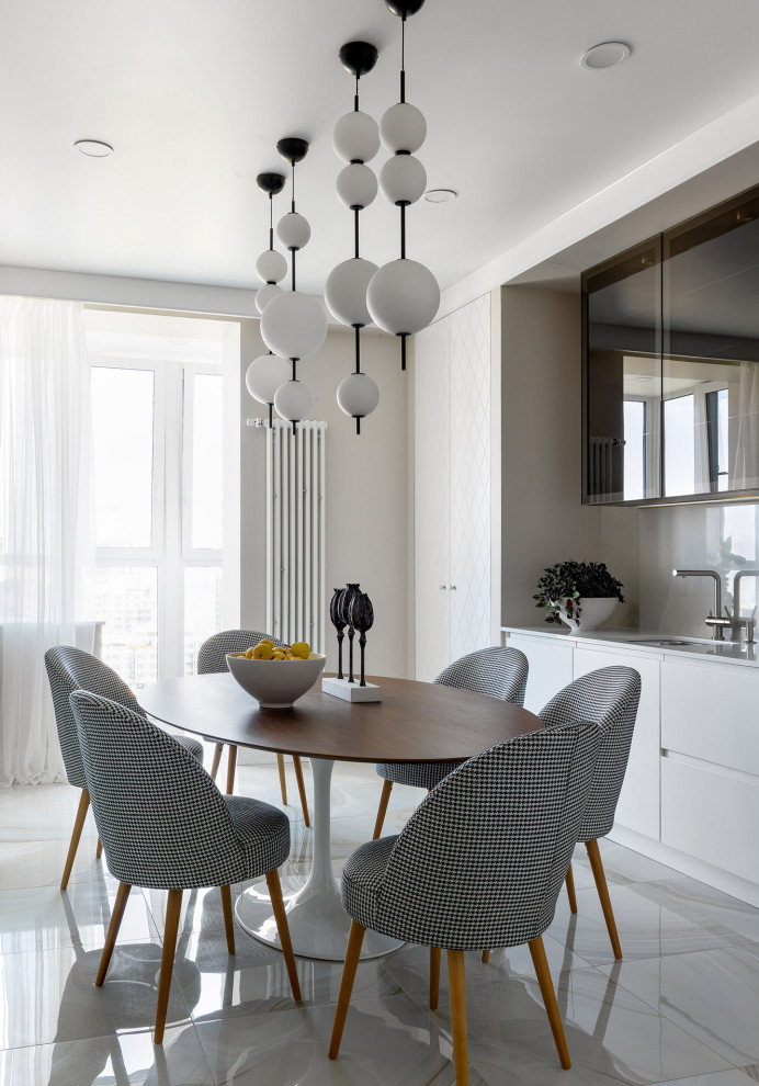 Свежая идея для дизайна: кухня-столовая в современном стиле с серым полом - отличное фото интерьера
