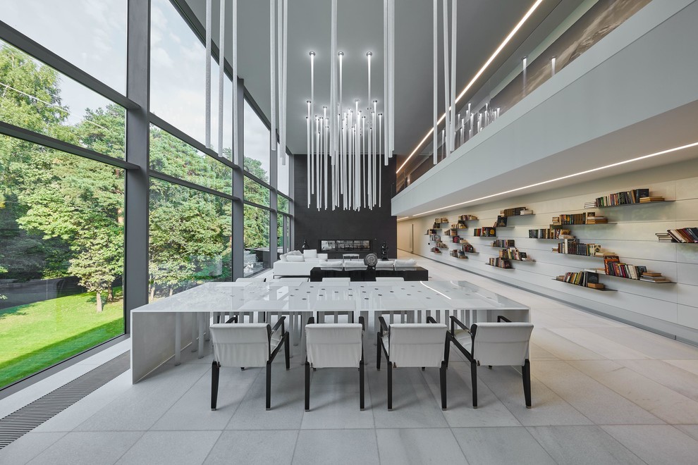Contemporary open plan dining room in Moscow with white walls and grey floors.
