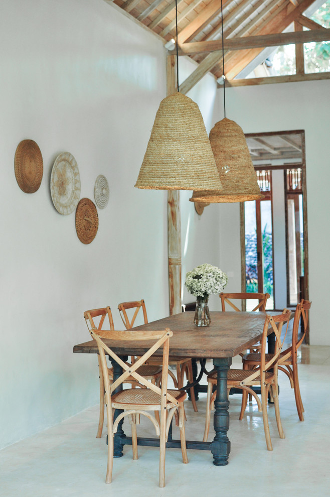 Inspiration for an asian dining room remodel in Other with white walls