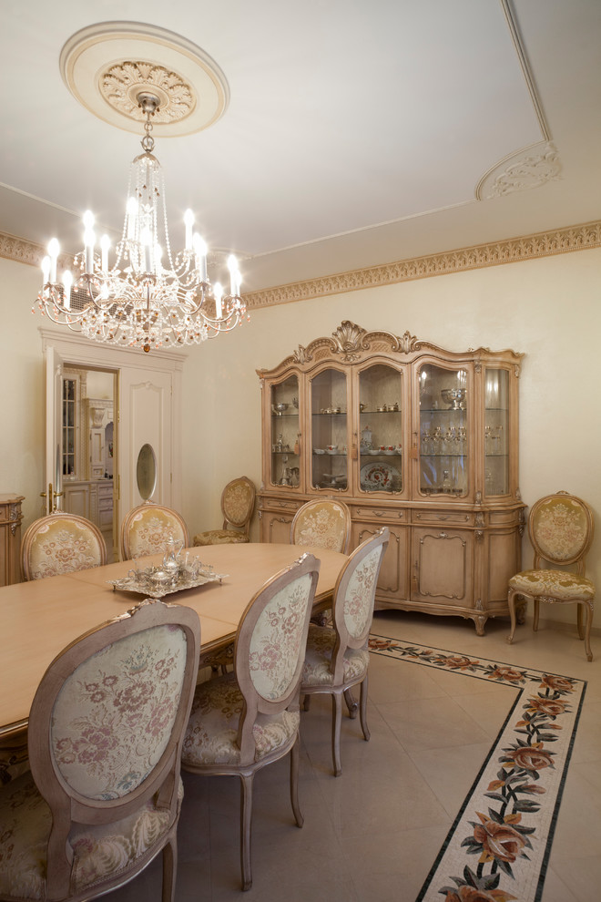 Photo of a large classic kitchen/dining room in Moscow with beige walls, marble flooring and beige floors.