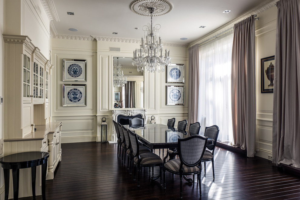 Inspiration for a classic dining room in Moscow with white walls and dark hardwood flooring.