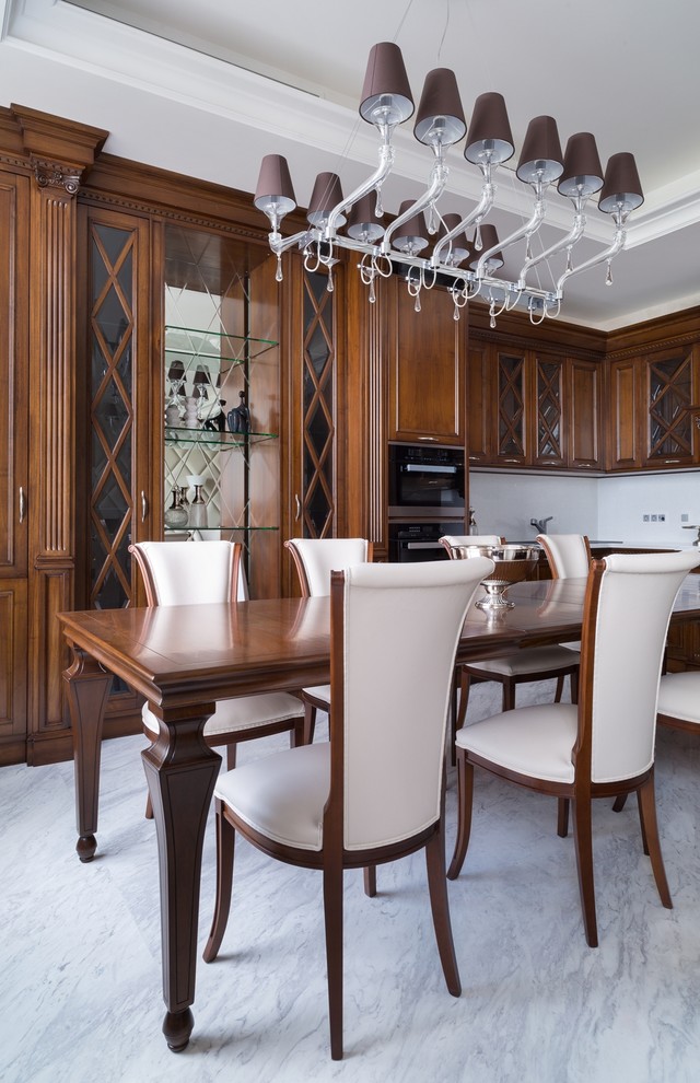 Photo of a medium sized classic dining room in Moscow with white walls and marble flooring.