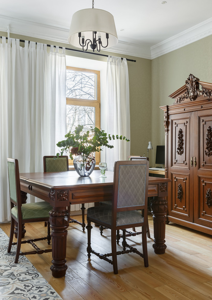 Design ideas for a small traditional dining room in Saint Petersburg.