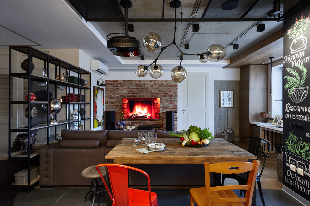 Design ideas for an urban open plan dining room in Moscow with feature lighting.