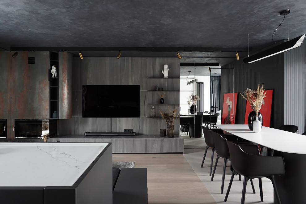 Idée de décoration pour une grande salle à manger ouverte sur la cuisine design avec un mur gris, un poêle à bois et un sol beige.