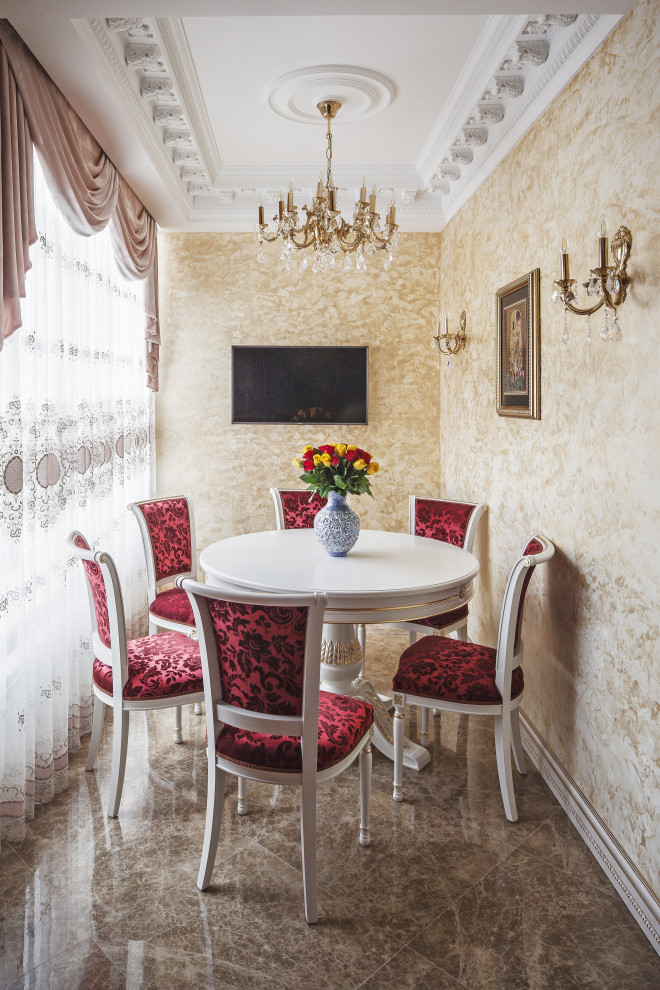 This is an example of a small victorian enclosed dining room in Moscow with beige walls, ceramic flooring and brown floors.