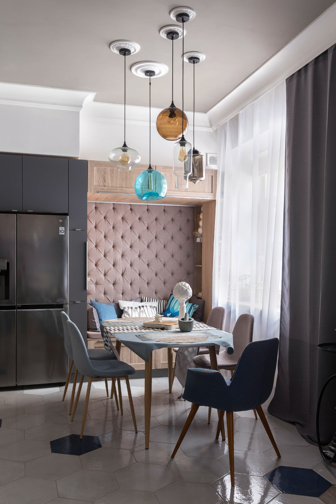Inspiration for a contemporary dining room in London with ceramic flooring and white floors.
