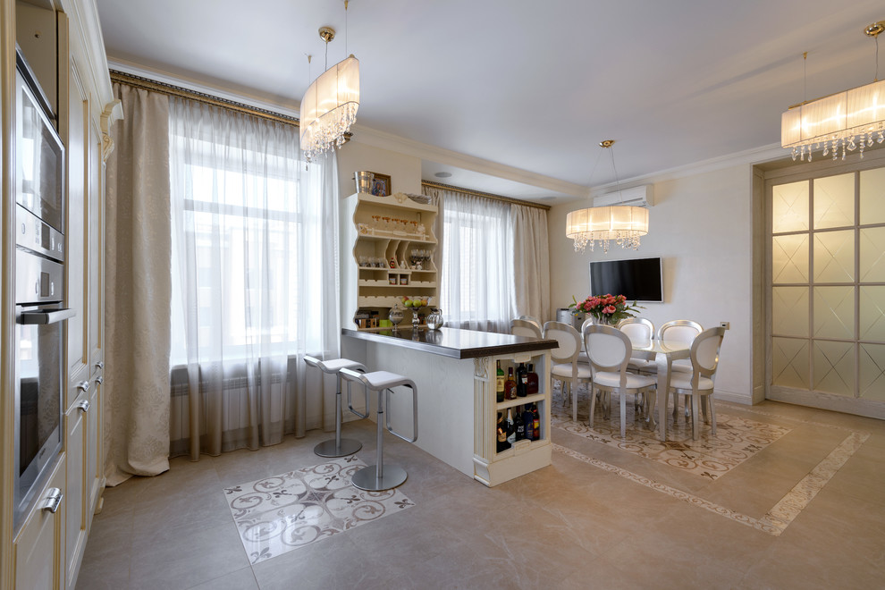 Example of a large classic ceramic tile kitchen/dining room combo design in Novosibirsk with beige walls