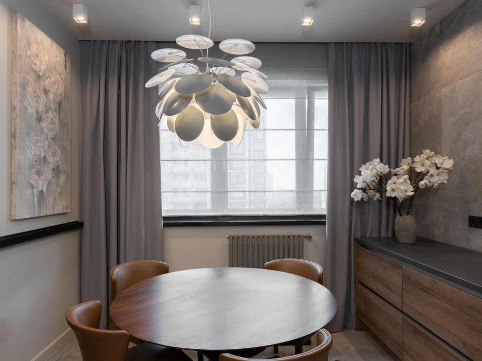 Inspiration for a contemporary gray floor dining room remodel in Moscow with gray walls