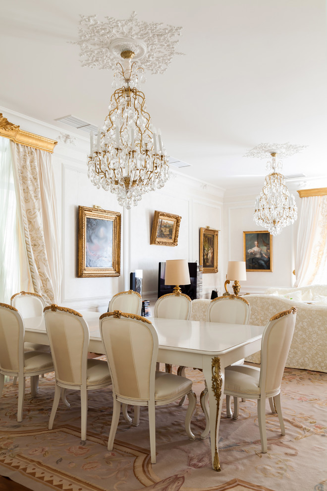 Design ideas for a traditional dining room in Moscow with white walls and carpet.