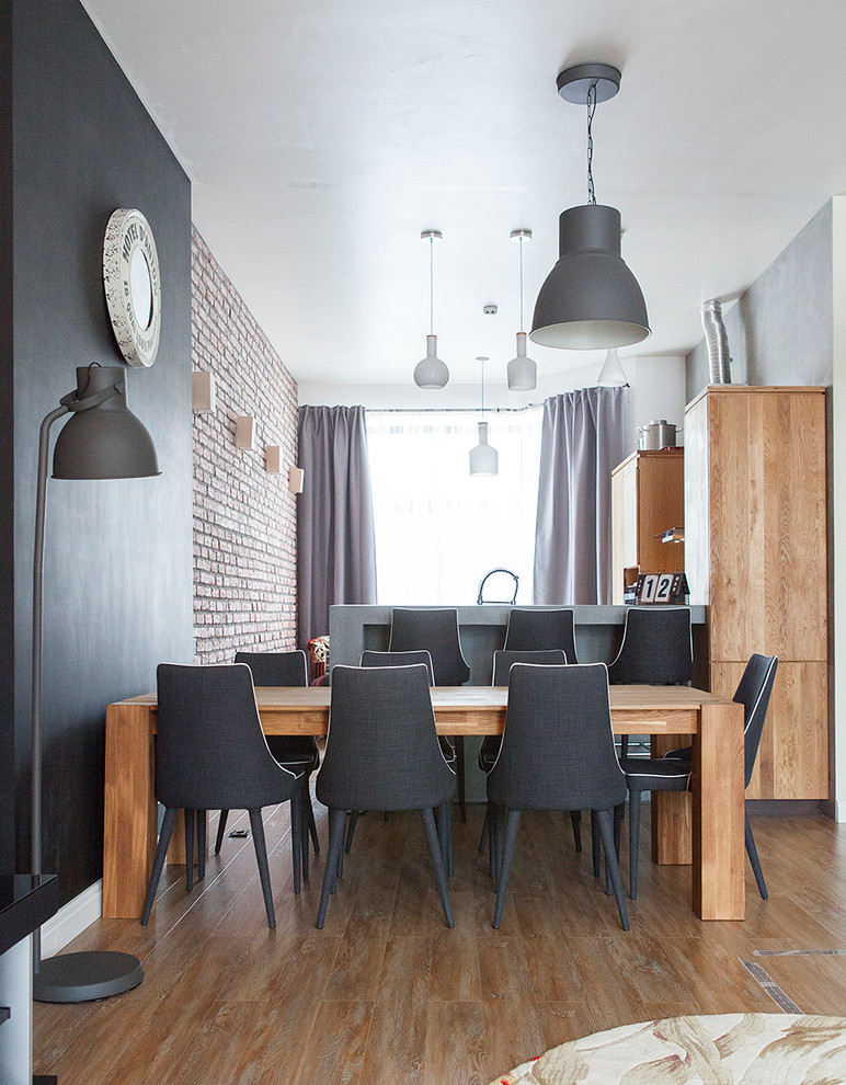 Contemporary open plan dining room in Moscow with medium hardwood flooring.