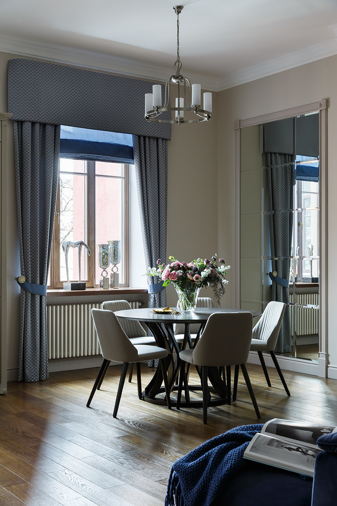 Photo of a large classic open plan dining room in Saint Petersburg with beige walls.