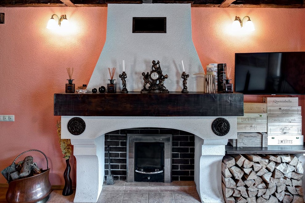 Mountain style dining room photo in Moscow with a ribbon fireplace and a plaster fireplace