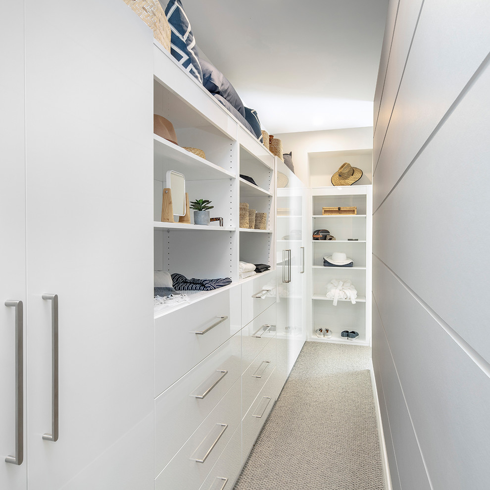 Example of a beach style closet design in Sydney