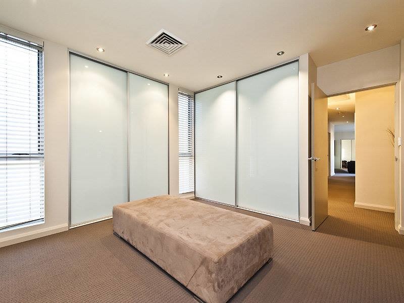 This is an example of a contemporary wardrobe in Perth.
