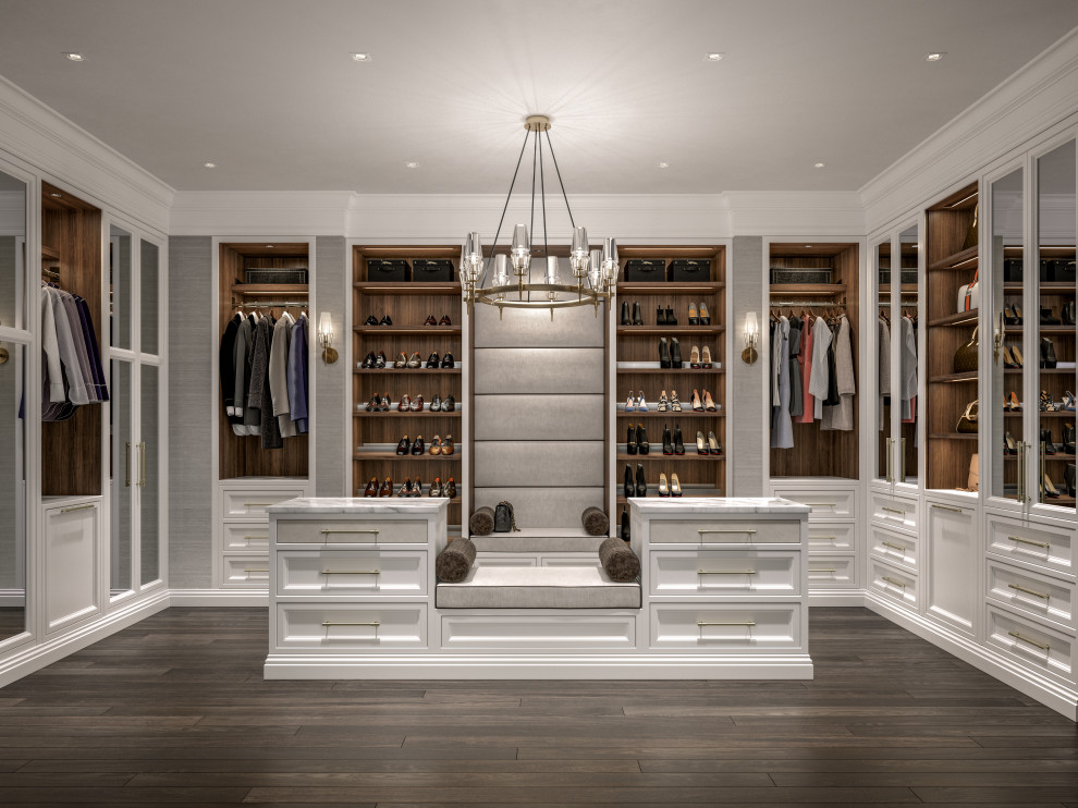 Example of a large transitional gender-neutral medium tone wood floor and gray floor dressing room design in Boston with recessed-panel cabinets and white cabinets