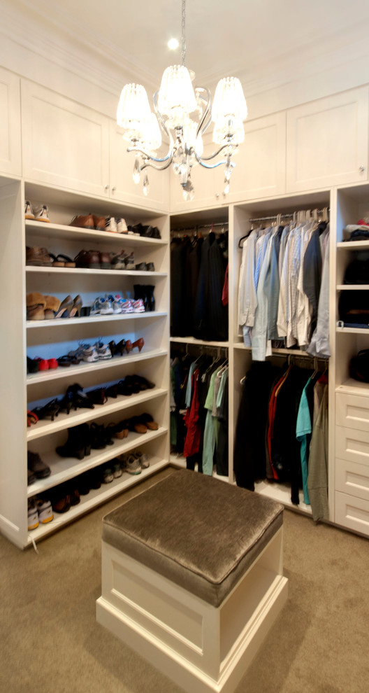 Example of a large classic gender-neutral carpeted and beige floor walk-in closet design in Melbourne with white cabinets and shaker cabinets